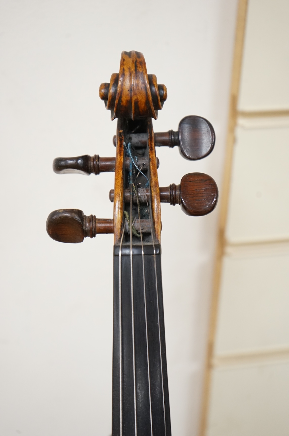 An interesting late 18th century violin, with one piece bird’s eye maple back, unsigned, with two silver fully mounted octagonal bows, one stamped Voight CITES Submission reference, 3XFNUBT7 and Submission reference, RHL